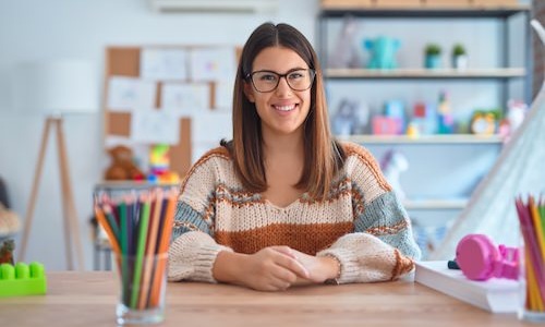 a teacher posing for a picture