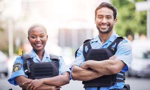 two cops posing for a picture
